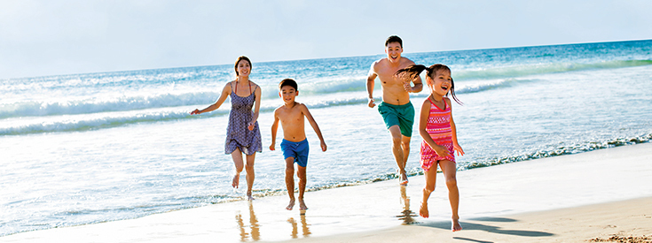 Family having fun at the beach Family having fun at the beach
