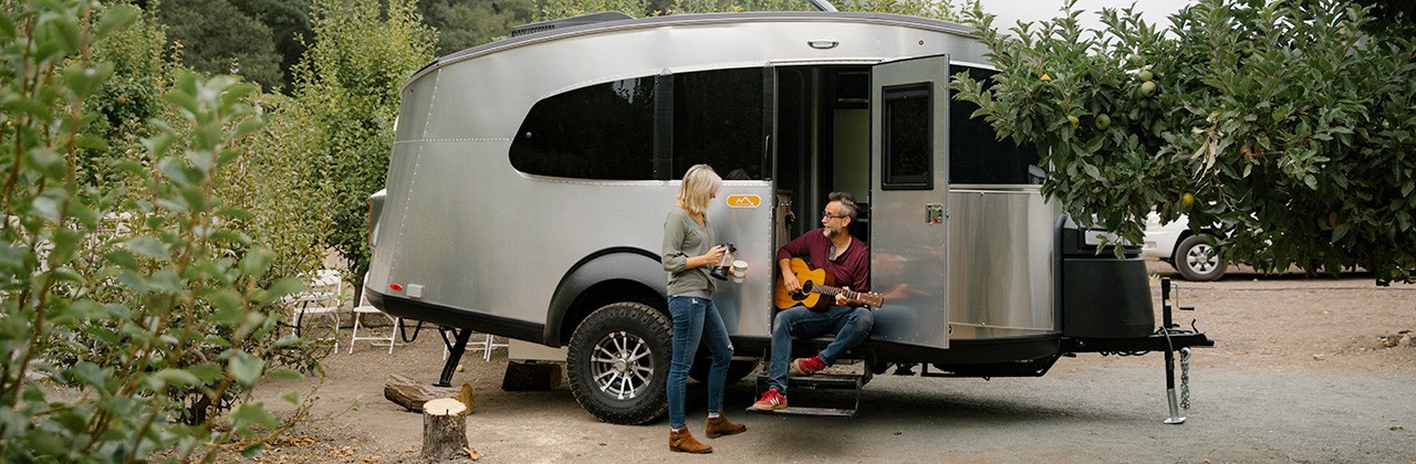 Writer Starshine Roshell and her husband John camping in an Airstream at See Canyon Fruit Ranch near Avila Beach.