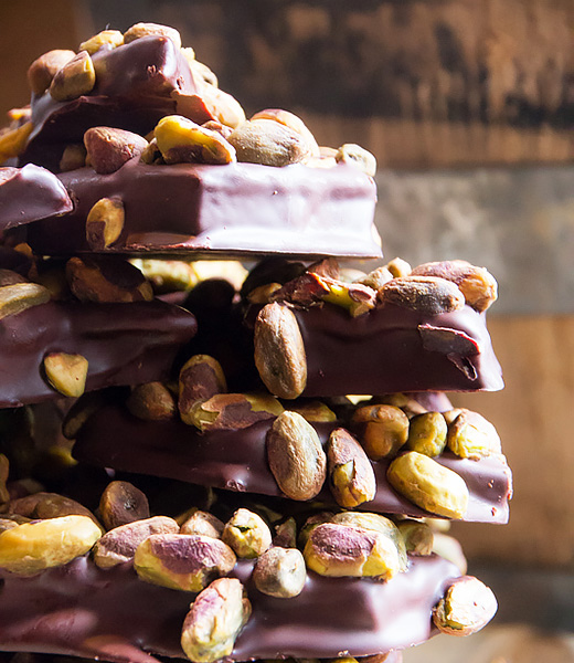 A pile of maple toffee studded with pistachios