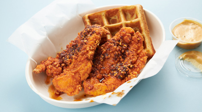 Fried chicken served with a waffle.