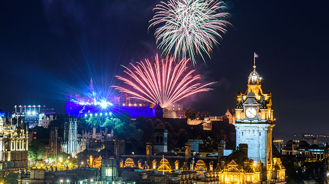 Fireworks illuminate the sky in Edinburgh, Scotland