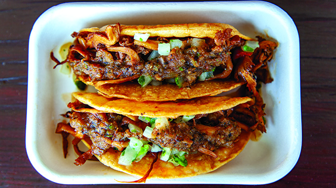 Hugo’s Tacos’ mushroom carnitas hard tacos.