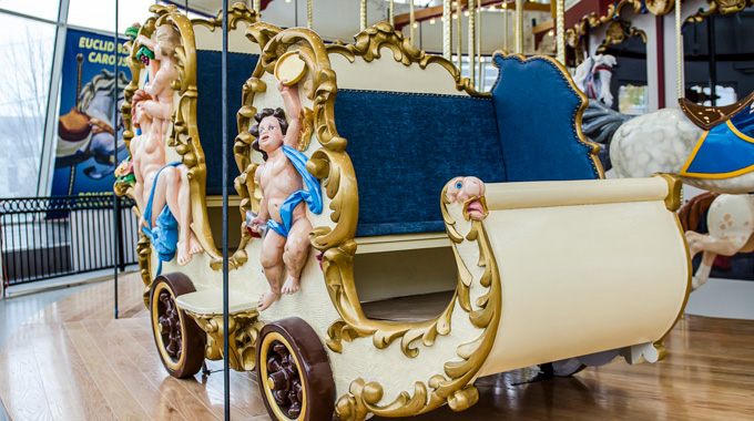 A chariot decorated with cherubs on the Euclid Beach Park Grand Carousel.