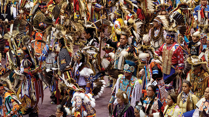Large crowd of Black Hills Powwow performers.