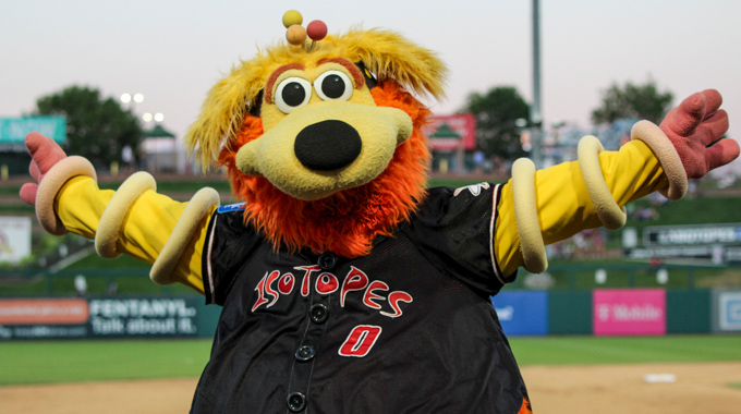 Orbit, the mascot for the Isotopes, on the field.